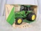 Ertl John Deere MFWD Row-Crop tractor with duals - 1/16th scale