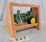 Ertl John Deere model A tractor with man - 40th Anniversary Commemorative - 1/16th scale