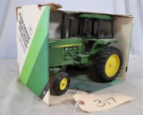 Ertl John Deere Row Crop Tractor with cab - 1/16th scale