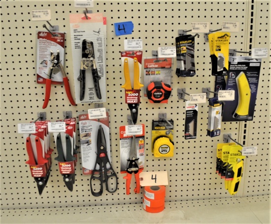 Assortment of punches, Utility Knives & blades, Aviation snips, tape measures, rolls of trail tape