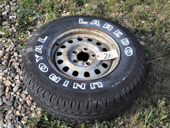 Uniroyal Laredo P235 75/R15 Tire & Rim