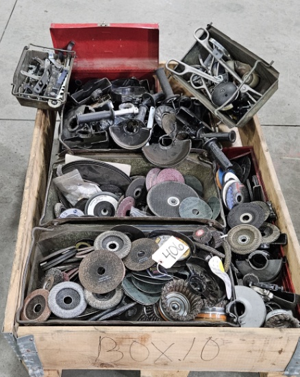 Large quantity of grinding discs and angle grinder handles and guards