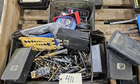 Hardware bin full of various sized drill bits and empty indexes