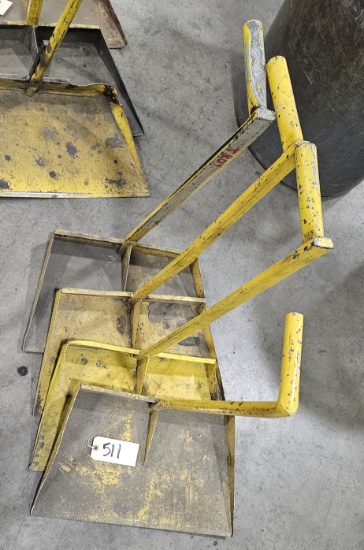 4 yellow metal handled dust pans