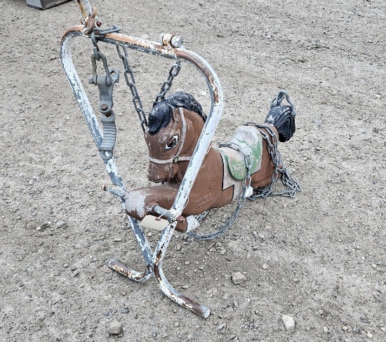 Cast iron horse swing