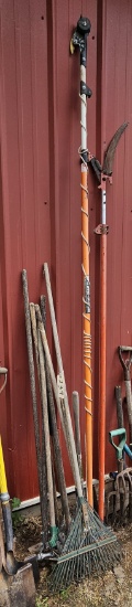 Assortment of Rakes & Hoes & Tree Trimmers & Misc