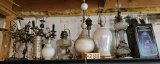 Assortment of lamps on Top Shelf and lamp Shades