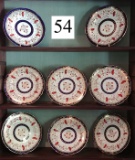 set of ten plates (eight pictured)