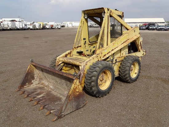 New Holland L-779 Skid Steer Loader, Perkins Diesel, 10-16.5 Tires, 66in Bucket, S/N: 550783