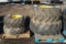 (4) Used Caterpillar Backhoe Tires w/ Rims, (2) 12.5/80-18 and (2) 19.5L-24