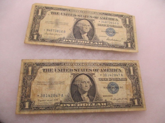 Two $1.00 Silver Certificates - con 572