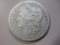 1884 Morgan Dollar con 200