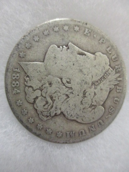 1884 Morgan Dollar con 200