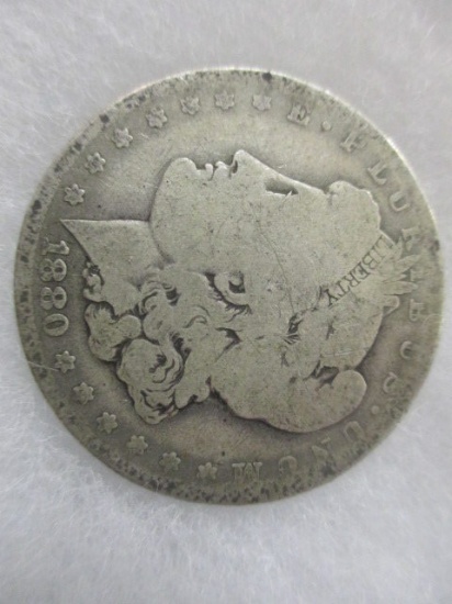 1880-O Morgan Dollar con 200