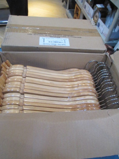 Two Boxes of New Wooden Hangers con 601