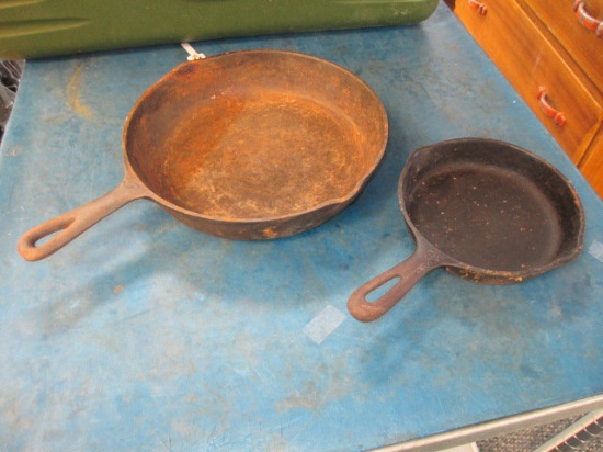 Two Cast Iron Pans - con 454