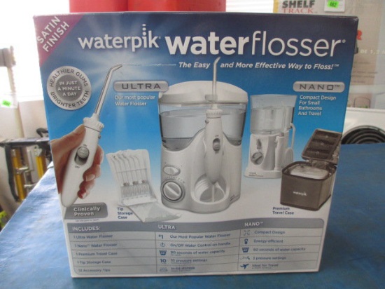 New Waterpik Water Flosser with Storage and Travel Case - con 576