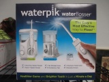 New waterpik Water Flosser with Storage and Case - con 576