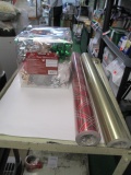 Two Rolls of Wrapping Paper and Bows - Will not be shipped -con 576