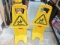 Two Plastic Caution Signs - Will not be shipped -con 757