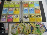Binder of Pokemon Cards and More - con 414