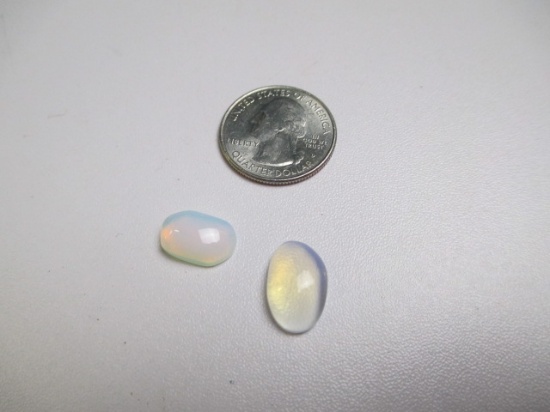 12.27 Tcw Two Moon Stones Caboshans - con 583