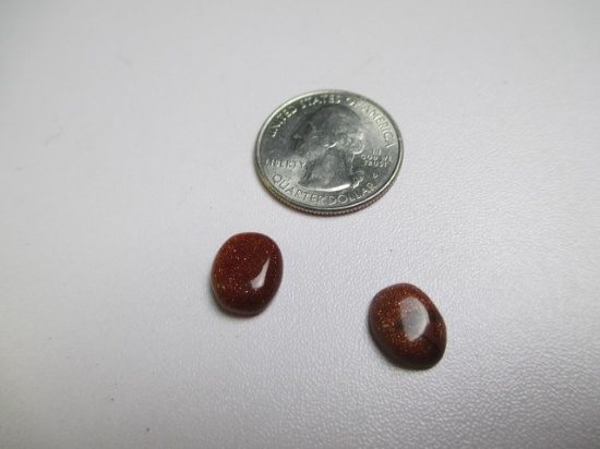 8.85 tcw Two Bloodstone Caboshans - con 583