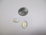 12.27 Tcw Two Moon Stones Caboshans - con 583