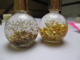 Two Vials of Gold Flakes and Gold Nugget - con 555