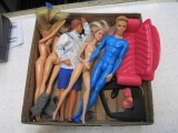 Assorted Barbie and Ken Dolls - con 555