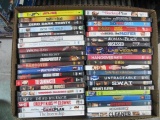 40 Assorted DVDs with Cases - con 555