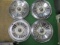 Four 1957 Ford Wheel Covers - con 698