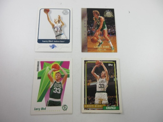 Four Larry Bird Cards - con 880