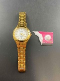 Pulsar Gold Tone Band Watch Water Resistant and Date - New Battery - con 686