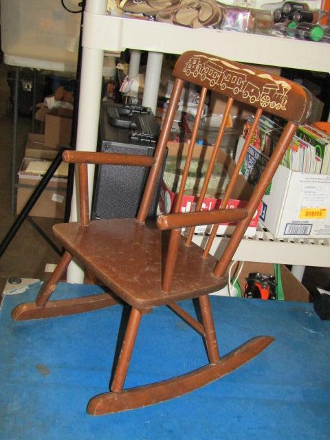 Child's rocking chair top with music box