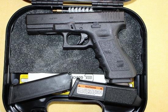 Glock .357 Auto, case, 3 clips, and cleaning kit
