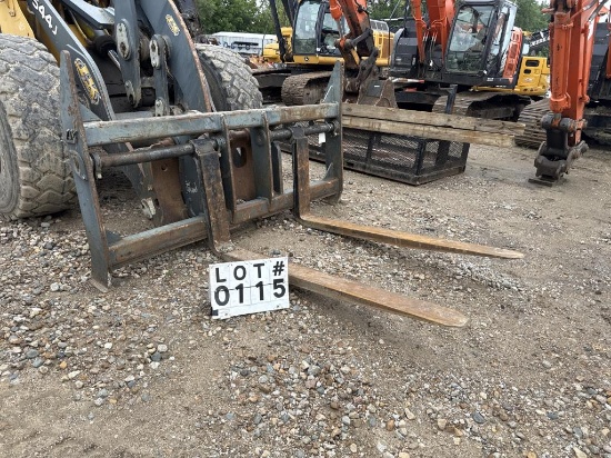 Fork attachment fits a John Deere 544-wheel loader