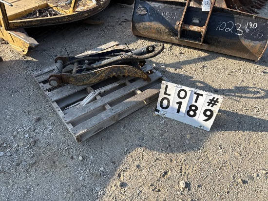 Thumb attachment for a mini excavator