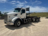 2015 PETERBILT 567 ROLL OFF TRUCK