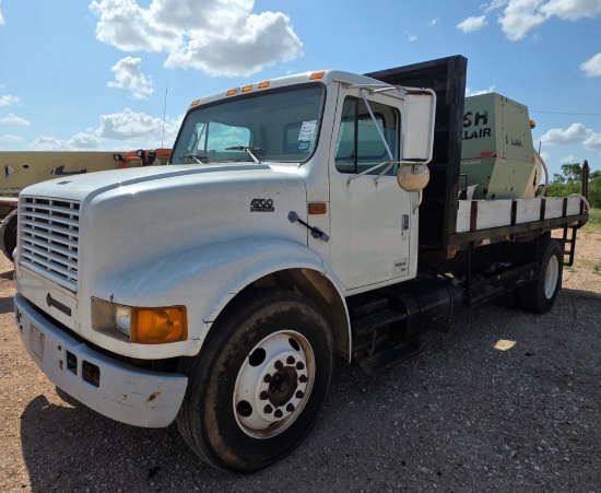 1999 INTERNATIONAL 4700 FLATBED TRUCK