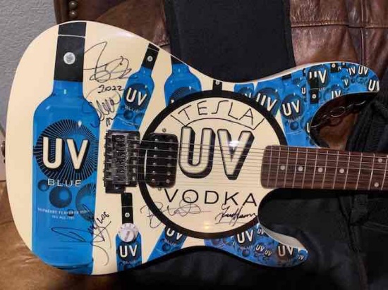 Autographed "Tesla" UV Vodka Guitar