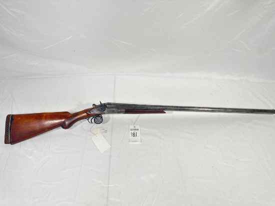 WM Moore SN# 5641 12GA Double Barrel Shotgun. The stock is cracked.