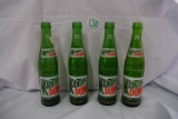 (4)  10 oz. Mountain Dew Bottles