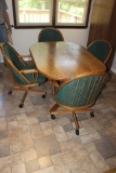 Table and 4 chairs with caster wheels