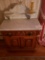 Burled walnut commode w/marble top backsplash and candle holders