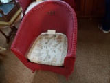 Red wicker rocker originally from Junior home Tiffin Ohio