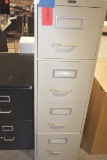 Tan 4 drawer file cabinet