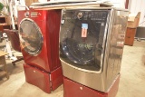 LG Front Load Washer & Electrolux Front Loading Dryer on bases & Ironing boards