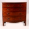 A CIRCA 1800 MAHOGANY HEPPLEWHITE BOW FRONT CHEST