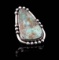 A MIKE PLATERO NAVAJO RING WITH ROYSTON TURQUOISE